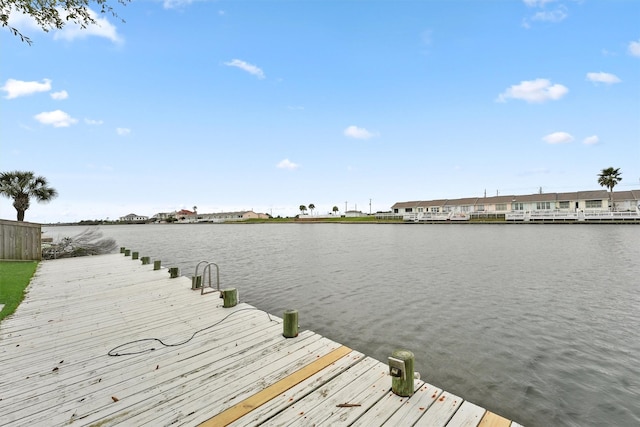 view of dock with a water view