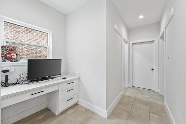 office with light tile patterned floors, recessed lighting, baseboards, and built in study area