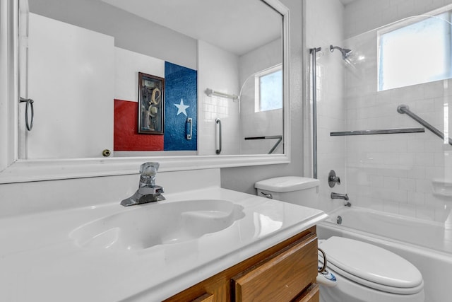 full bathroom featuring tub / shower combination, vanity, and toilet