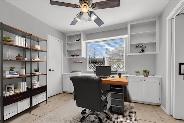 office with light tile patterned floors and ceiling fan