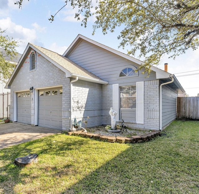 ranch-style home featuring a garage, a front yard, fence, and brick siding