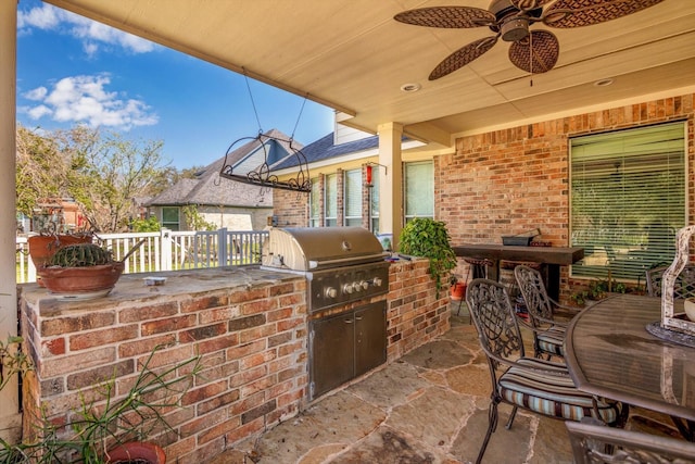 view of patio featuring a ceiling fan and area for grilling