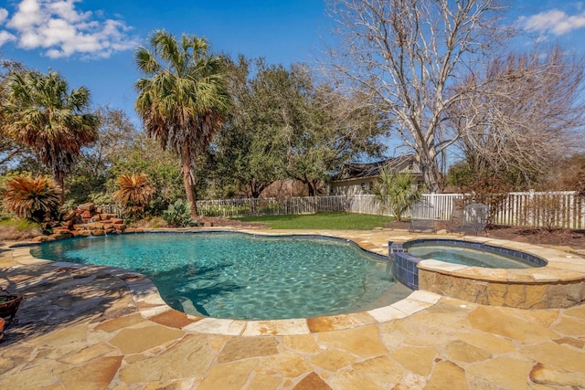 view of pool featuring a patio area, a fenced backyard, and a pool with connected hot tub