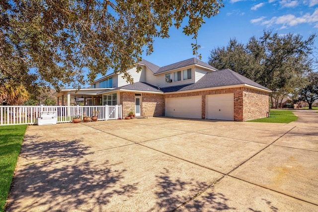 view of front of house with covered porch, a garage, brick siding, fence, and concrete driveway