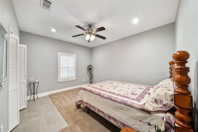 8133 N Fm 565th Rd, Baytown, TX 77523 - bedroom with baseboards, visible vents, recessed lighting, light colored carpet, and ceiling fan