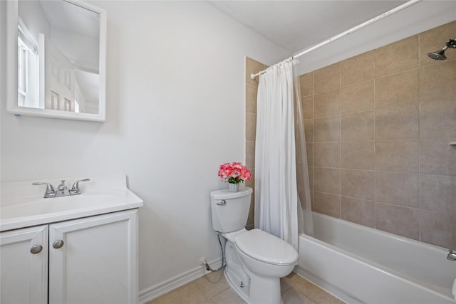 full bath featuring shower / bath combination with curtain, toilet, vanity, baseboards, and tile patterned floors