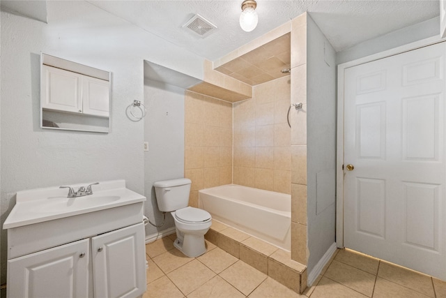 bathroom featuring visible vents, toilet, tile patterned floors, a textured ceiling, and vanity