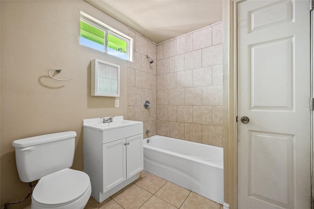 bathroom featuring vanity, shower / bathing tub combination, tile patterned flooring, and toilet