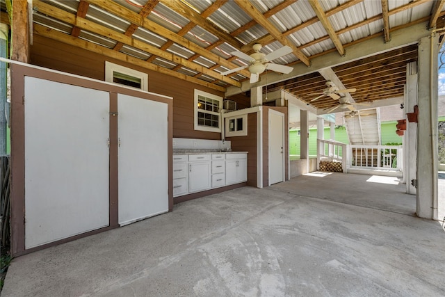 garage with a ceiling fan