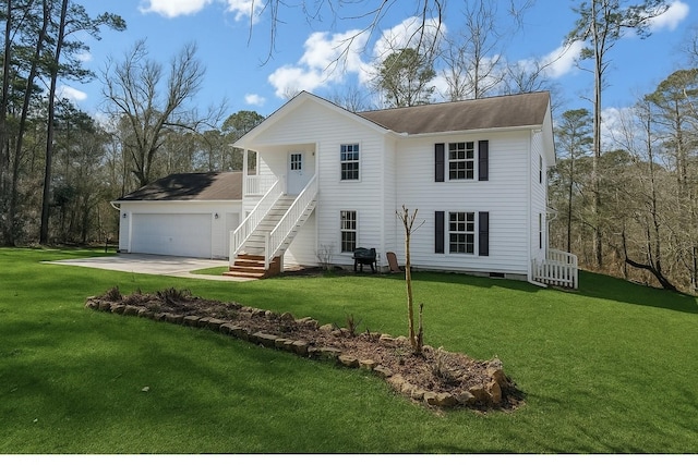view of front of property with roof with shingles, a front yard, and concrete driveway