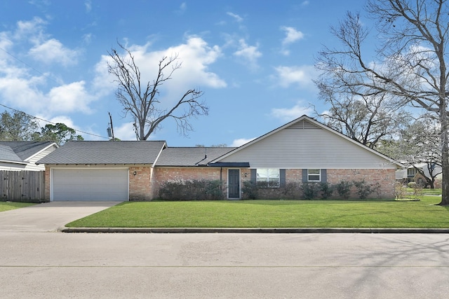 ranch-style house featuring brick siding, concrete driveway, an attached garage, fence, and a front lawn