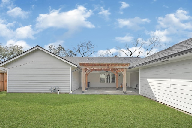 back of house with a patio area, fence, a lawn, and a pergola