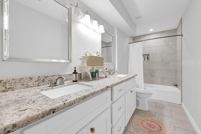 bathroom with a sink, shower / bathtub combination with curtain, toilet, and double vanity