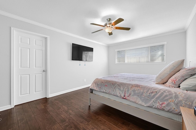 bedroom with ornamental molding, ceiling fan, baseboards, and hardwood / wood-style flooring