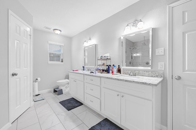 full bathroom with double vanity, tiled shower, a sink, and visible vents