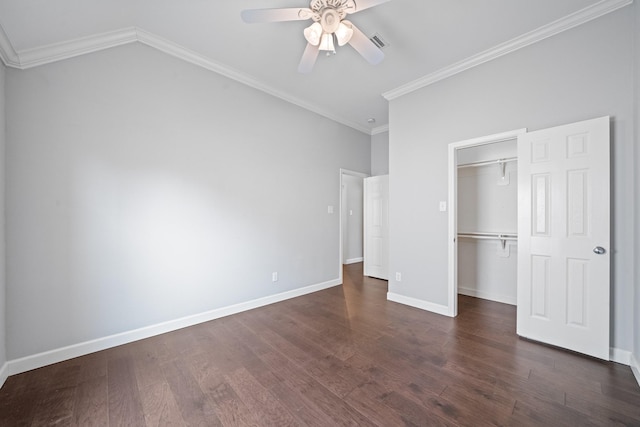 unfurnished bedroom featuring ornamental molding, wood finished floors, and visible vents