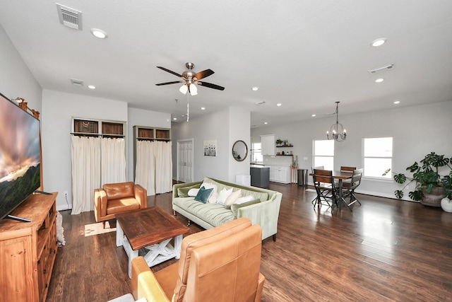 living room featuring visible vents, wood finished floors, and recessed lighting