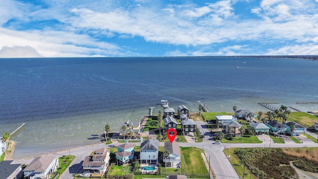 aerial view with a residential view and a water view