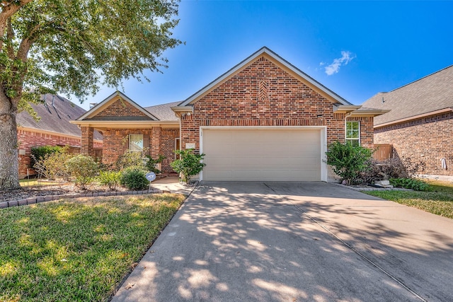 single story home featuring a garage, driveway, and brick siding