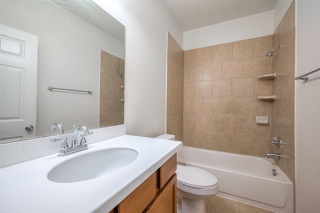 bathroom with shower / bath combination, tile patterned flooring, vanity, and toilet