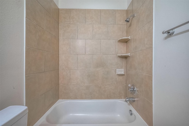 full bathroom featuring shower / bathing tub combination and toilet