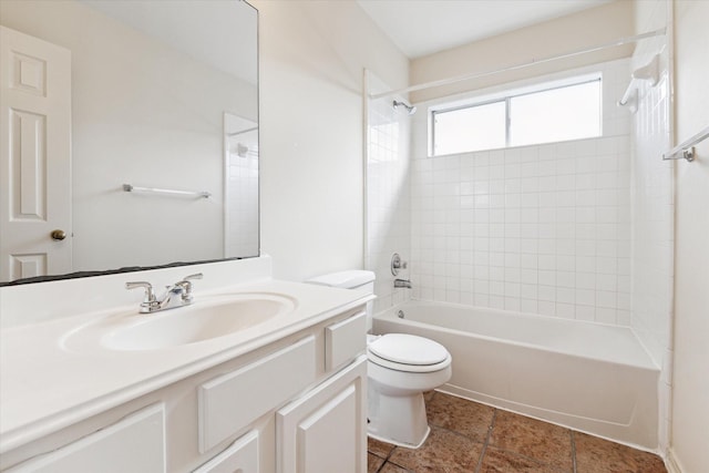 bathroom featuring toilet, shower / washtub combination, and vanity