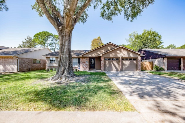 ranch-style home featuring an attached garage, driveway, a front yard, and brick siding