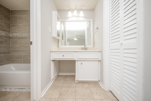 full bathroom featuring a ceiling fan, tile patterned flooring, vanity, and baseboards