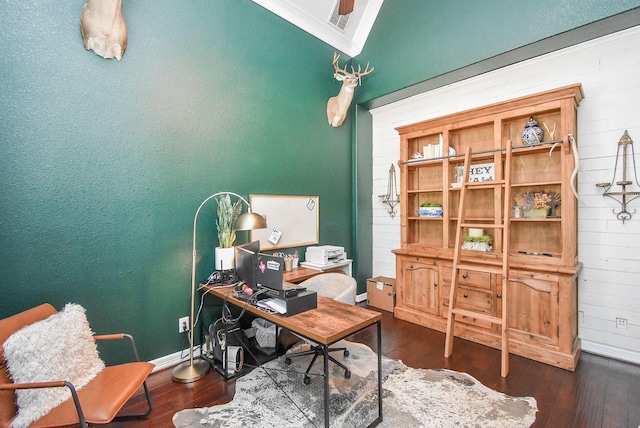 home office featuring crown molding, wood finished floors, visible vents, and baseboards