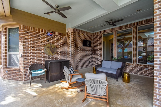 view of patio featuring an outdoor hangout area and a ceiling fan