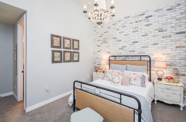 carpeted bedroom featuring brick wall, a notable chandelier, and baseboards