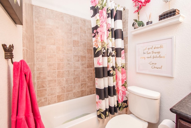 bathroom featuring toilet, shower / bath combo, and vanity