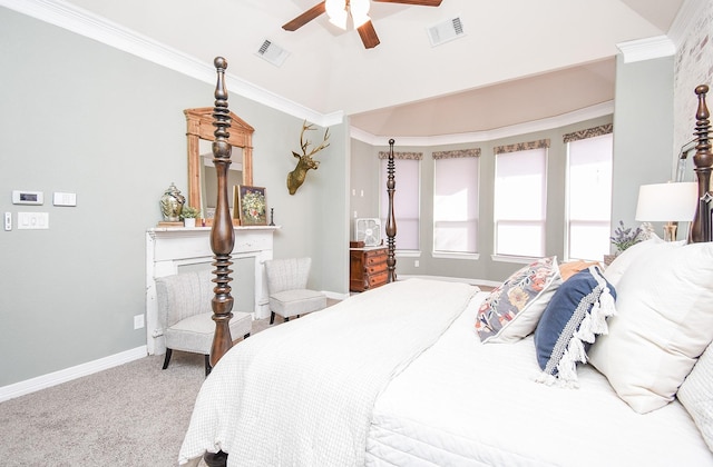 carpeted bedroom featuring baseboards, a fireplace, visible vents, and crown molding