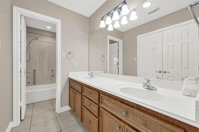 bathroom featuring tile patterned flooring, a sink, visible vents, double vanity, and washtub / shower combination