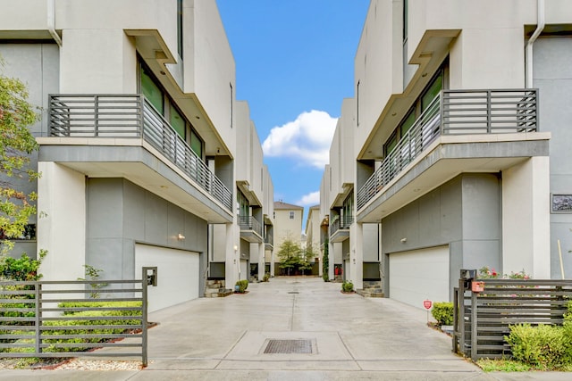 view of street featuring driveway and a residential view