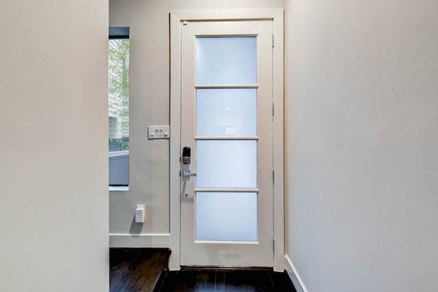 entryway featuring dark wood-type flooring