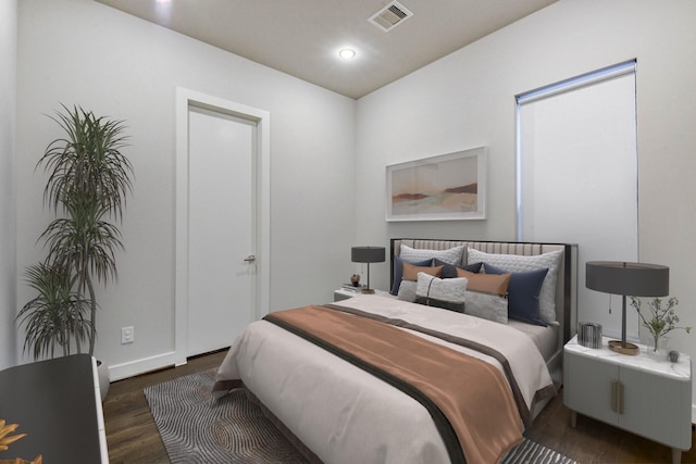 bedroom featuring recessed lighting, visible vents, and wood finished floors