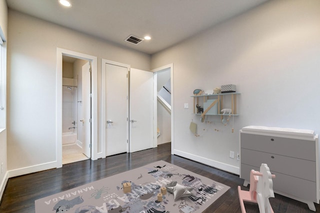 bedroom featuring recessed lighting, baseboards, and wood finished floors