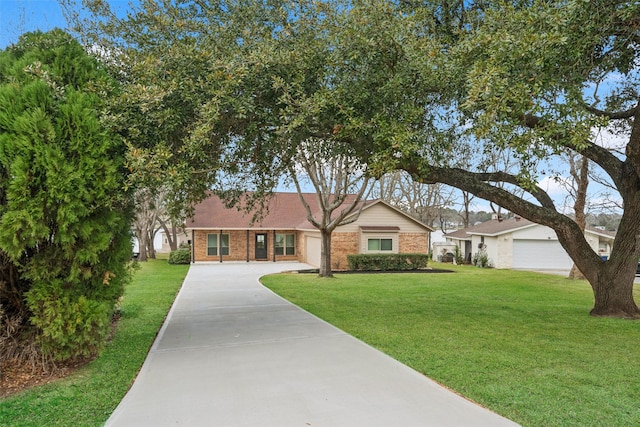 ranch-style home with a garage, driveway, brick siding, and a front yard