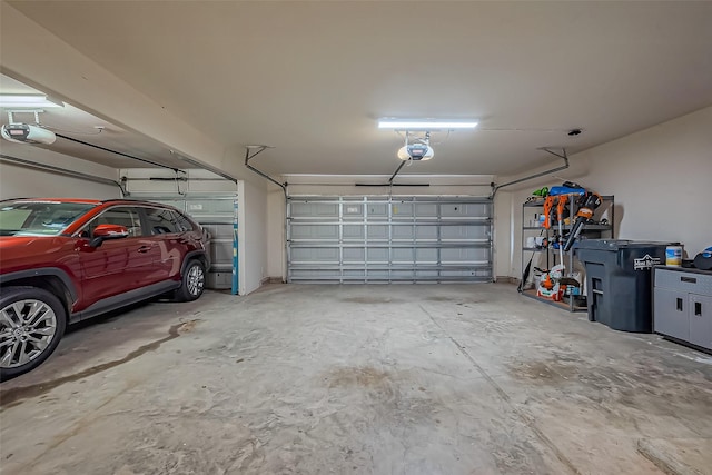 garage featuring a garage door opener