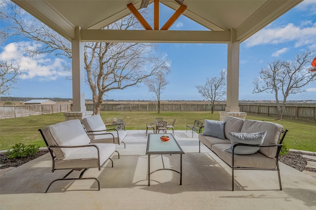 view of patio / terrace featuring a fenced backyard and an outdoor living space