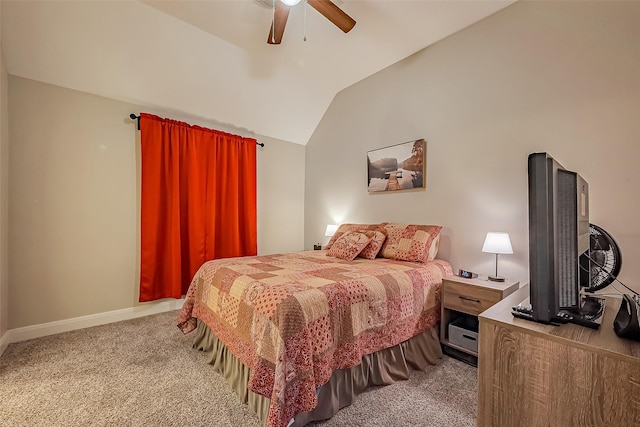 bedroom with lofted ceiling, carpet floors, a ceiling fan, and baseboards