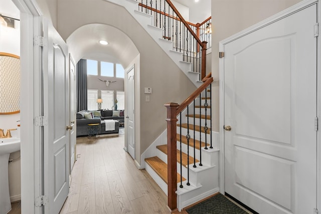 8603 Rexford Cove Ct, Richmond, TX 77407 - stairway featuring baseboards and wood finished floors