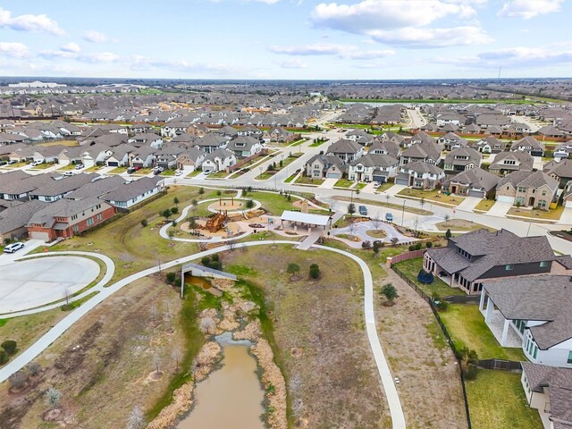 8603 Rexford Cove Ct, Richmond, TX 77407 - birds eye view of property with a water view and a residential view