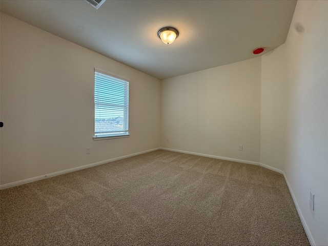18757 Lucas Michael Way, New Caney, TX 77357 - carpeted empty room featuring baseboards