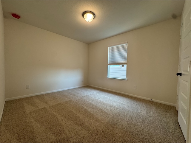 18757 Lucas Michael Way, New Caney, TX 77357 - unfurnished room featuring carpet flooring and baseboards