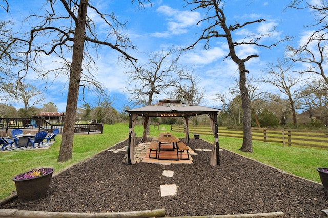 view of yard with a gazebo and fence