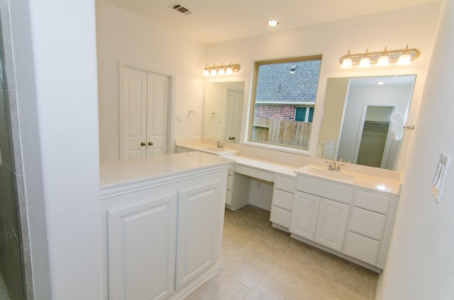 bathroom with tile patterned flooring, vanity, recessed lighting, and visible vents