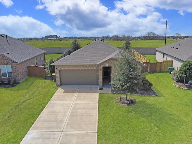 ranch-style house featuring an attached garage, a shingled roof, brick siding, concrete driveway, and a front yard