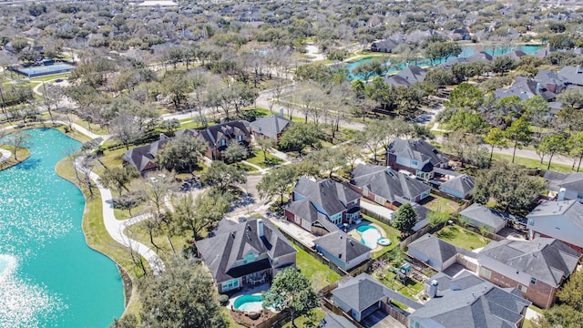 aerial view with a residential view and a water view